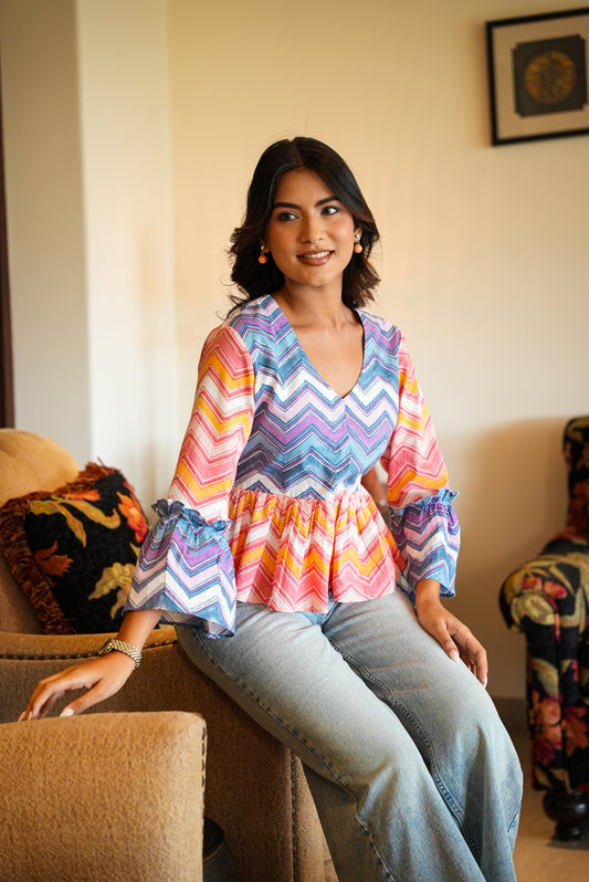 Daisy – Multicolor Chevron Peplum Top